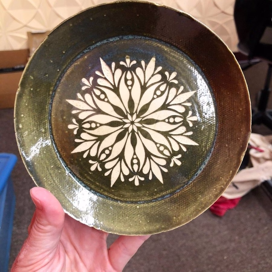 Sandblasted design on small plate