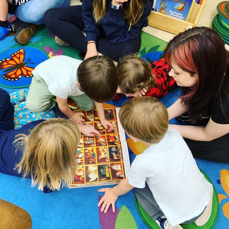 Early childhood students work together on activity