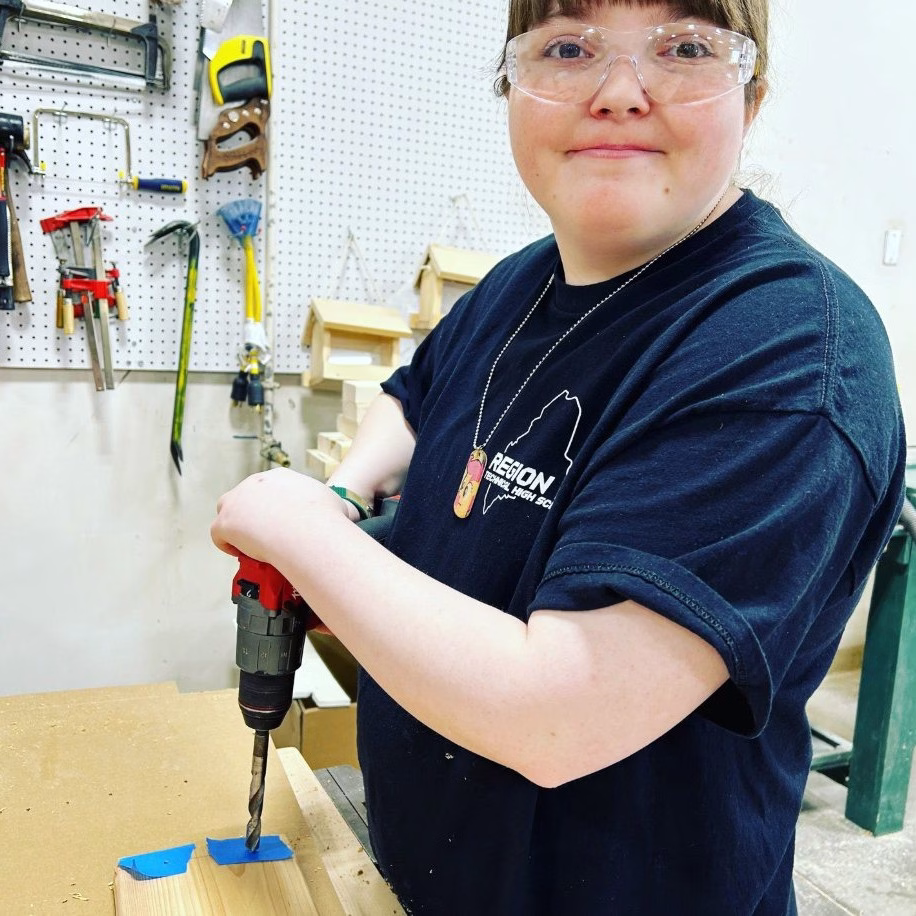 General trades student practices woodworking